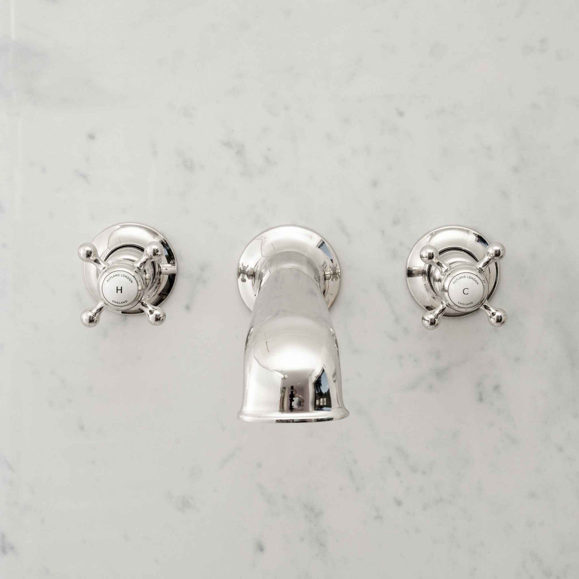 Leicester White Ceramic Crosshead Wall Mounted Three Hole Bath Mixer - Rutland London