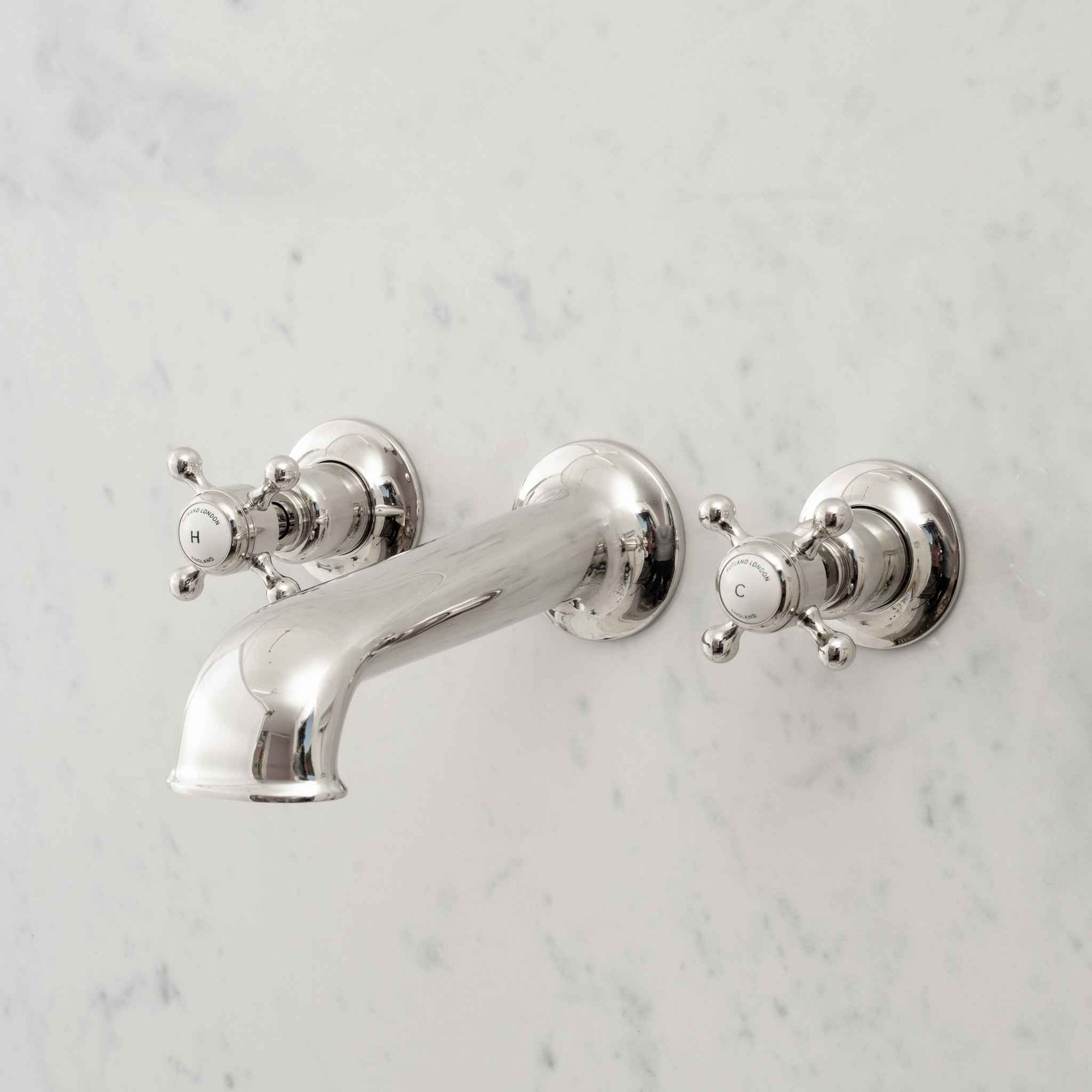 Leicester White Ceramic Crosshead Wall Mounted Three Hole Bath Mixer - Rutland London