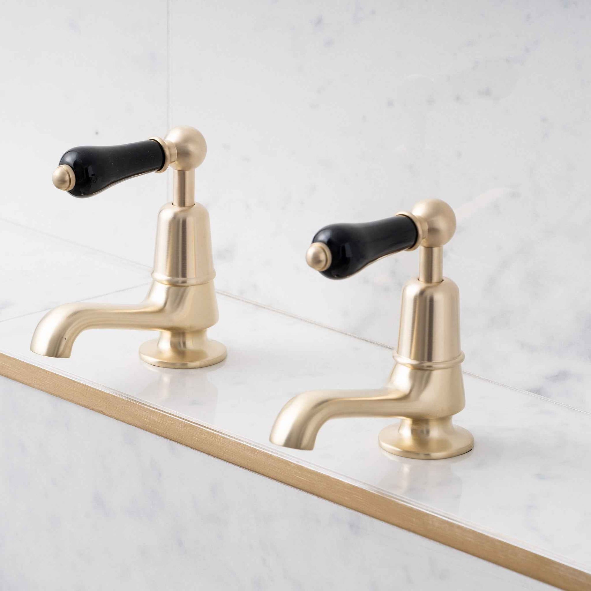 Brunswick Black Ceramic Lever Basin Pillar Taps - Rutland London