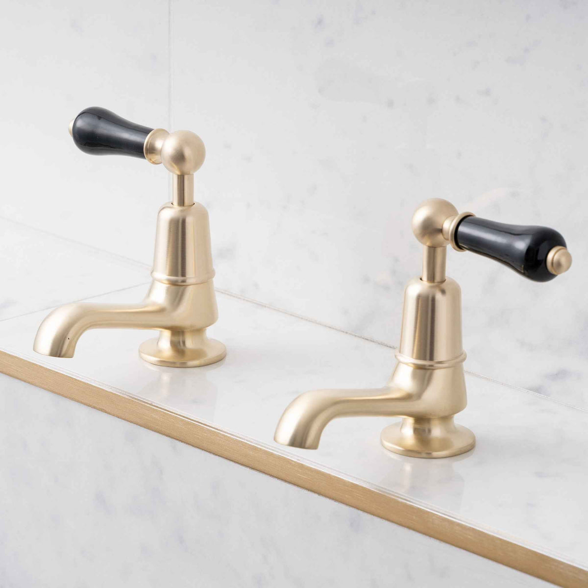 Brunswick Black Ceramic Lever Basin Pillar Taps - Rutland London