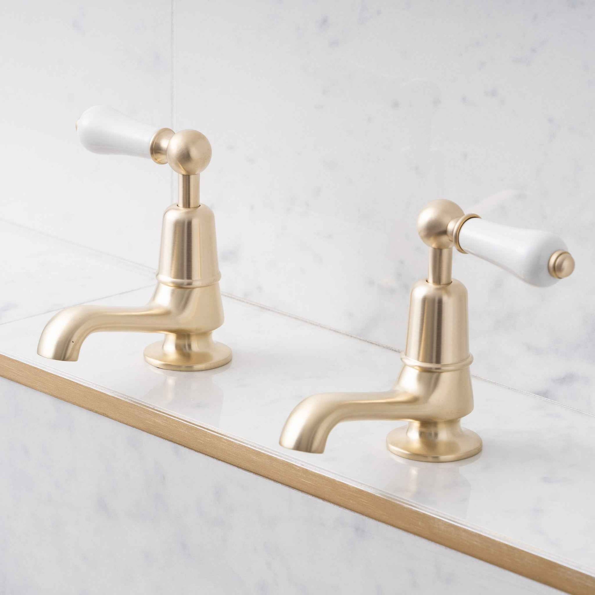 Brunswick White Ceramic Lever Basin Pillar Taps - Rutland London